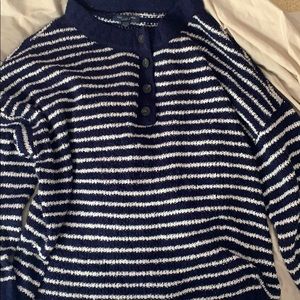 Blue and white striped half buttoned sweater